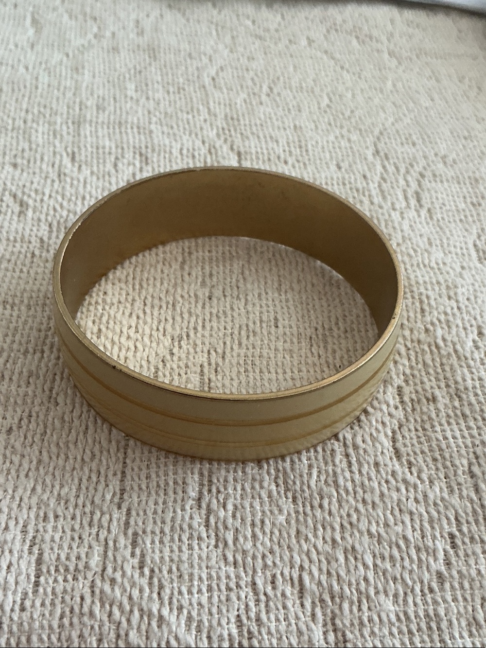 French vintage. Also goes by La Vie Parisienne gold filled striped enamel bangle